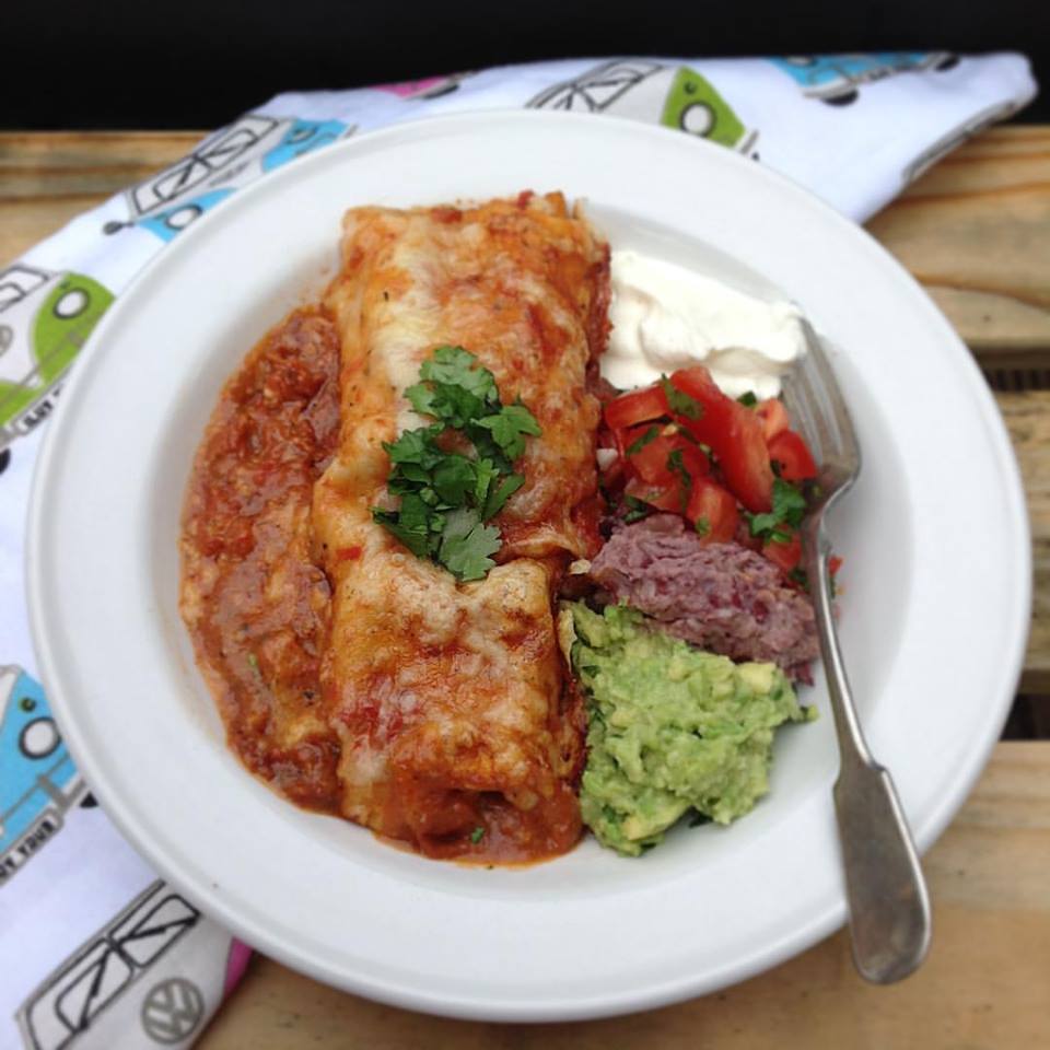 Homemade Enchiladas with all the sides.